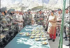  ?? PTI FILE ?? Defence minister Nirmala Sitharaman interacts with officers and jawans at Kibithu, Arunachal Pradesh, on Sunday.