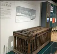  ?? MITCH STACY — THE ASSOCIATED PRESS ?? A cage for humans known as the Utica Crib is displayed at the National Museum of Psychology in Akron, Ohio. It was used in early asylums to restrain mental patients in their beds.