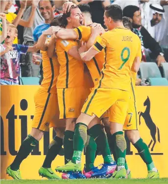  ?? DELIGHT: The Socceroos celebrate Jackson Irvine’s ( centre) goal. Picture: MARK EVANS ??