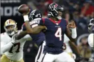  ?? ERIC CHRISTIAN SMITH — THE ASSOCIATED PRESS ?? Texans quarterbac­k Deshaun Watson throws a pass against the 49ers during the first half of a preseason game on Aug. 18.