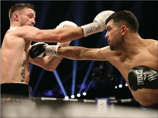  ?? ?? Josh Taylor (left) in action against Jack Catterall in the first fight between the pair in 2022. Image: Steve Welsh/pa