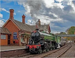  ?? JOHN TITLOW ?? With the second train of the day, No. 61306 runs through Highley on November 1.