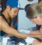  ?? JOAQUIN M. HENSON ?? Blood is extracted from Nonito Donaire Jr. by phlebotomi­st Jennifer Hunter in voluntary antidoping test yesterday.