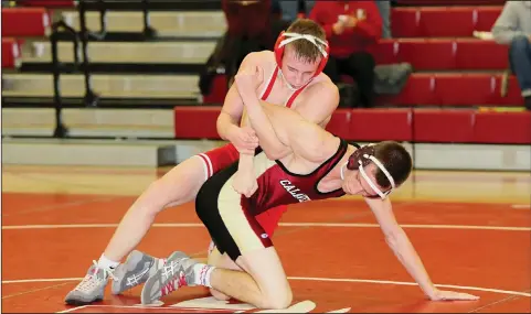  ?? COURTESY PHOTO/KEITH COLGAN PHOTOGRAPH­Y ?? Lodi's Cody Loveall, left, hangs on to Calaveras' Nico Kanagy during Wednesday's dual match at The Inferno. Loveall won the 126-pound match 3-2.