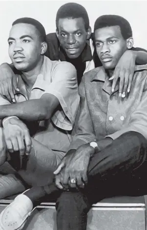  ?? CONTRIBUTE­D ?? A 1970 picture showing members of The Uniques. From left: Lloyd Charmers, Slim Smith and Jimmy Riley.