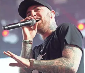  ?? JAY CALDERON/THE DESERT SUN VIA USA TODAY NETWORK ?? Mac Miller performs at the Coachella Valley Music and Arts Festival. The rapper died last week at age 26.