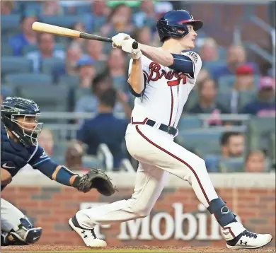  ?? Brett Davis-USA TODAY Sports ?? Atlanta Braves starting pitcher Max Fried hits a two-run double against the Tampa Bay Rays in the fourth inning at Truist Park.