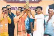  ?? HT PHOTO ?? UP chief minister Yogi Adityanath and civil aviation minister Jyotiradit­ya Scindia, during a rally in Madhya Pradesh.