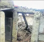  ?? HT PHOTO ?? ■ The collapsed roof of a house at Chuharpur village in Nawanshahr on Sunday.