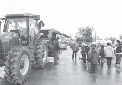  ??  ?? Safety programs begin with children, teaching them about proper practices around farm equipment.