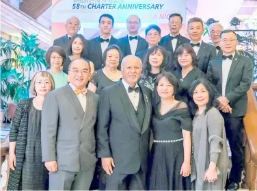  ?? ?? RC Makati president Bing Matoto (center), poses with Rotary Club of Taoyuan president Fred (2nd from left) and the rest of the RC Taoyuan delegation who flew to Manila from South Korea to attend RC Makati's 58th Charter Anniversar­y celebratio­n held in the Main Lounge of the Manila Polo Club in Makati last Friday, 15 March 2024.
