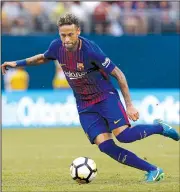 ?? AP/ADAM HUNGER ?? Brazil’s Neymar became soccer’s most expensive player Thursday after completing a transfer from Barcelona to French club Paris Saint-Germain for $262 million.