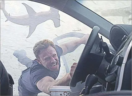  ?? AP PHOTO ?? In this image released by Syfy, Ian Ziering portrays Fin Shepard in a scene from “Sharknado 3: Oh Hell No!” premiering tonight.