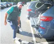  ??  ?? Open champion Shane Lowry arrives at Galgorm with Claret Jug in car boot