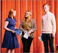  ?? Marc Hayot/Herald Leader ?? Isabelle Pennick (left), who plays Maria, and Clayton Hoskins, who plays Georg von Trapp, discuss their escape with Mother Superior (Britney O’Brien) during a practice for the Siloam Springs High School’s production of The Sound of Music.