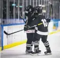  ?? PHOTO: JAY FRENCH ?? Big win . . . Members of the Ice Blacks celebrate their win over Australia last night secured a convincing series win against their transtasma­n foes.