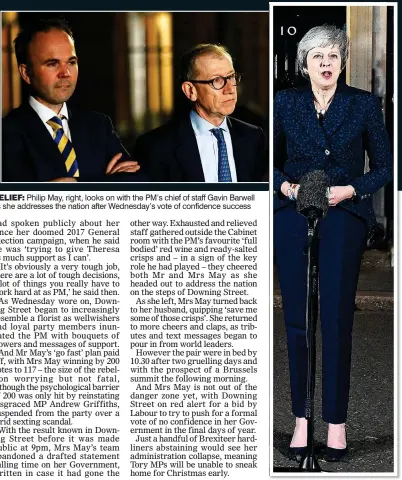  ??  ?? RELIEF: Philip May, right, looks on with the PM’s chief of staff Gavin Barwell as she addresses the nation after Wednesday’s vote of confidence success