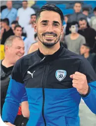  ??  ?? Beram Kayal was a happy man in Haifa