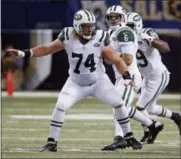  ?? TOM GANNAM - THE ASSOCIATED PRESS ?? FILE - In this Nov. 8, 2012, file photo, New York Jets center Nick Mangold (74) drops back in protection for quarterbac­k Mark Sanchez (6) during the third quarter of an NFL football game against the St. Louis Rams, in St. Louis.