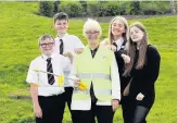  ??  ?? Team effort Councillor Cathy McEwan with (from left) JamieJoe McNicol, Brodie Andrews, Kirsty Lyle and Erin Lafferty