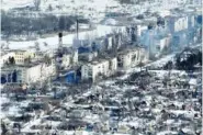  ?? AP PHOTO ?? On Feb. 13, drone footage shows how the longest battle of the year-long Russian invasion has turned the city of salt and gypsum mines in eastern Ukraine into a ghost town.