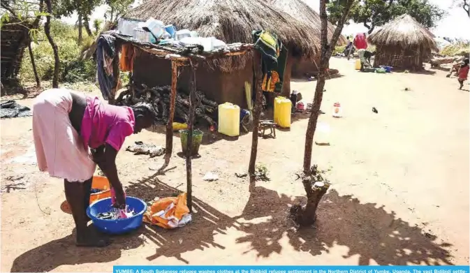  ??  ?? YUMBE: A South Sudanese refugee washes clothes at the Bidibidi refugee settlement in the Northern District of Yumbe, Uganda. The vast Bidibidi settlement in far northern Uganda has sprung up over the past year as people flood out of South Sudan,...