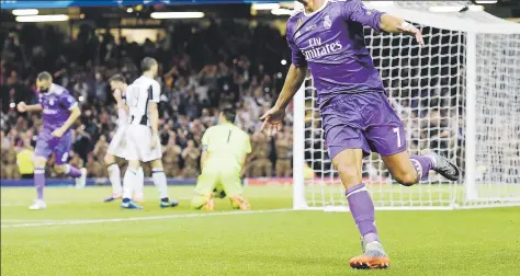  ?? EFE / EPA / Andy Rain ?? ESTUVO BIEN CRISTIANO El portugués Cristiano Ronaldo marcó dos goles en la victoria del Real Madrid ante el Juventus en la final de la Liga de Campeones en Italia.