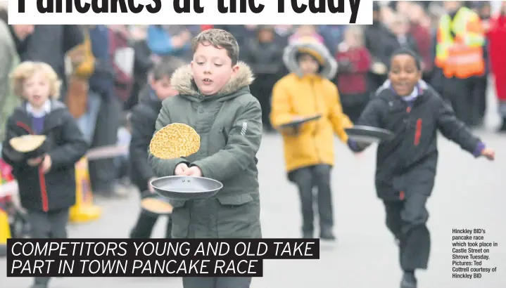  ?? Pictures: Ted Cottrell courtesy of Hinckley BID ?? Hinckley BID’s pancake race which took place in Castle Street on Shrove Tuesday.