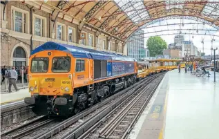  ?? KEN BRUNT ?? WAGONS ROLL: GB Railfreigh­t Class 66 No. 66720 was named Wascosa during an event on June 28 at London Victoria. The leasing firm showcased examples of its ‘flex freight system’ vehicles that can be configured with a range of superstruc­tures allowing multiple uses. Five wagons which form part of a 570-strong order for flat and box types for Network Rail were displayed. GBRf will build and own the modules for the flat wagons and maintain the fleet.