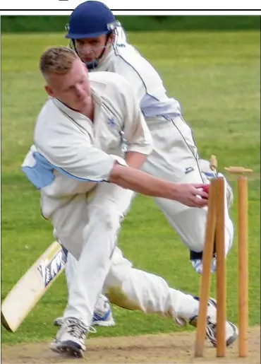  ?? Picture: Paul Amos FM3353805 ?? Ashford Town’s Jonah Diedrick is run out by Rodmersham bowler Martin Henry during Saturday’s Kent League match. See pages 80-81