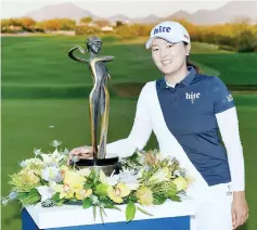  ?? — AFP photo ?? Ko Jin-young poses with the trophy after winning the Bank Of Hope Founders Cup at the Wildfire Golf Club in Phoenix, Arizona.