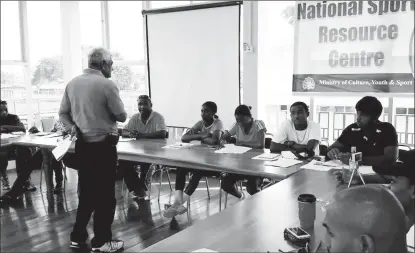  ??  ?? Flashback: Dr. Steve Surujbally in 2014, conducting an umpires training session for tennis at National Racquet Centre.