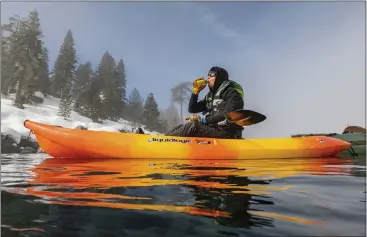  ?? CLEAN UP THE LAKE VIA AP ?? This photo shows Surface Support on the 72Mile Clean Up during the winter in Lake Tahoe, Nev. Scuba divers who spent the past year cleaning up Lake Tahoe's entire 72-mile shoreline have come away with tons of trash.