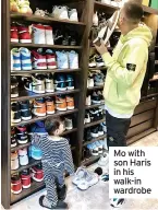  ?? ?? Mo with son Haris in his walk-in wardrobe