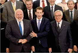  ?? — AFP ?? President of the European Commission Jean- Claude Juncker ( front row, R), Austrian chancellor Sebastian Kurz ( C) and European commission vice- president Frans Timmermans pose for a photo with commission­ers and delegation members before a meeting at...
