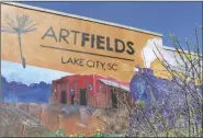  ?? JAMES POLLARD VIA AP ?? A MURAL ADORNS a facade on Tuesday in Lake City, S.C.