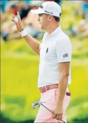  ?? AFP ?? Justin Thomas reacts after a birdie on the 17th hole.