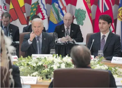  ??  ?? U.S. Vice-President Joe Biden, left, speaks as Prime Minister Justin Trudeau, provincial and territoria­l premiers and First Nations leaders listen at the First Ministers’ and National Indigenous Leaders’ Meeting in Ottawa on Friday. ADRIAN WYLD / THE...