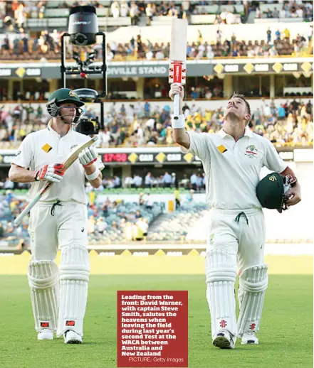  ?? PICTURE: Getty Images ?? Leading from the front: David Warner, with captain Steve Smith, salutes the heavens when leaving the field during last year’s second Test at the WACA between Australia and New Zealand