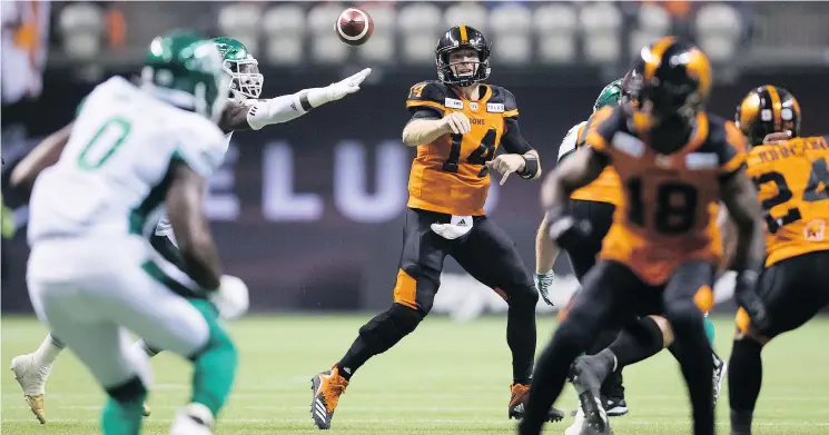  ?? — CP PHOTO ?? Lions QB Travis Lulay passed for 240 yards and a TD against the Saskatchew­an Roughrider­s, but he mostly failed to move the chains at key moments all night.