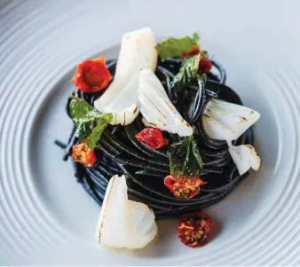  ??  ?? COLD SPAGHETTI AND SQUID INK