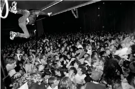  ?? ?? ‘I thought he was going to break his neck’ … Nirvana play the University of Washington Hub Ballroom, Seattle, 1990. Photograph: Charles Peterson