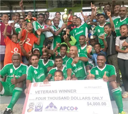  ?? Photo: Arieta Vakasukawa­qa ?? JK Builders Nadi players and fans celebrate after wining the RC Manubhai/Apco Veteran Internatio­nal tournament at Prince Charles Park, Nadi, on August 20, 2017.