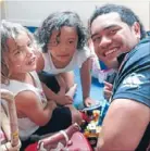  ??  ?? Hurrell with Kidz First Children’s Hospital patients.