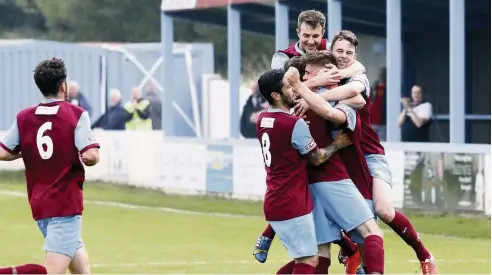  ??  ?? Colwyn Bay celebrate their second goal in last Saturday’s victory over Stamford. The 2-1 result ended a seven-match winless run for the Seagulls. Pic: STEVE LEWIS