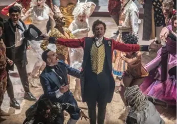  ?? NIKO TAVERNISE/TWENTIETH CENTURY ?? The Greatest Showman, starring Hugh Jackman, has been lifted by positive word-of-mouth.