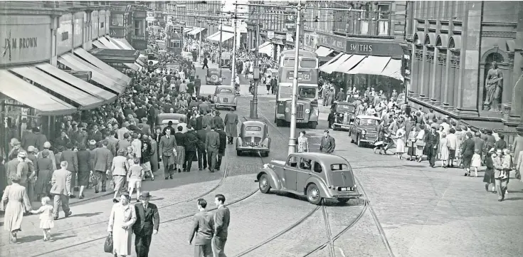  ??  ?? A bustling Murraygate in 1956 – perhaps the May sunshine brought everyone out.