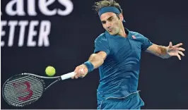  ?? (AFP) ?? Roger Federer hits a return against Denis Istomin during their men's singles match on Monday