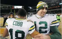  ?? Charles Rex Arbogast/The Associated Press ?? Packers quarterbac­k Aaron Rodgers and wide receiver Randall Cobb have been practising the past week without injury limitation­s.