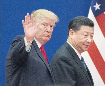  ??  ?? RAISING FLAG: US President Donald Trump and China’s President Xi Jinping leaving a business leaders event in Beijing on Nov 9 last year.